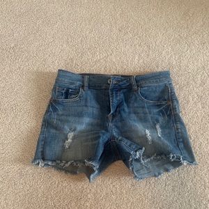 Distressed denim shorts